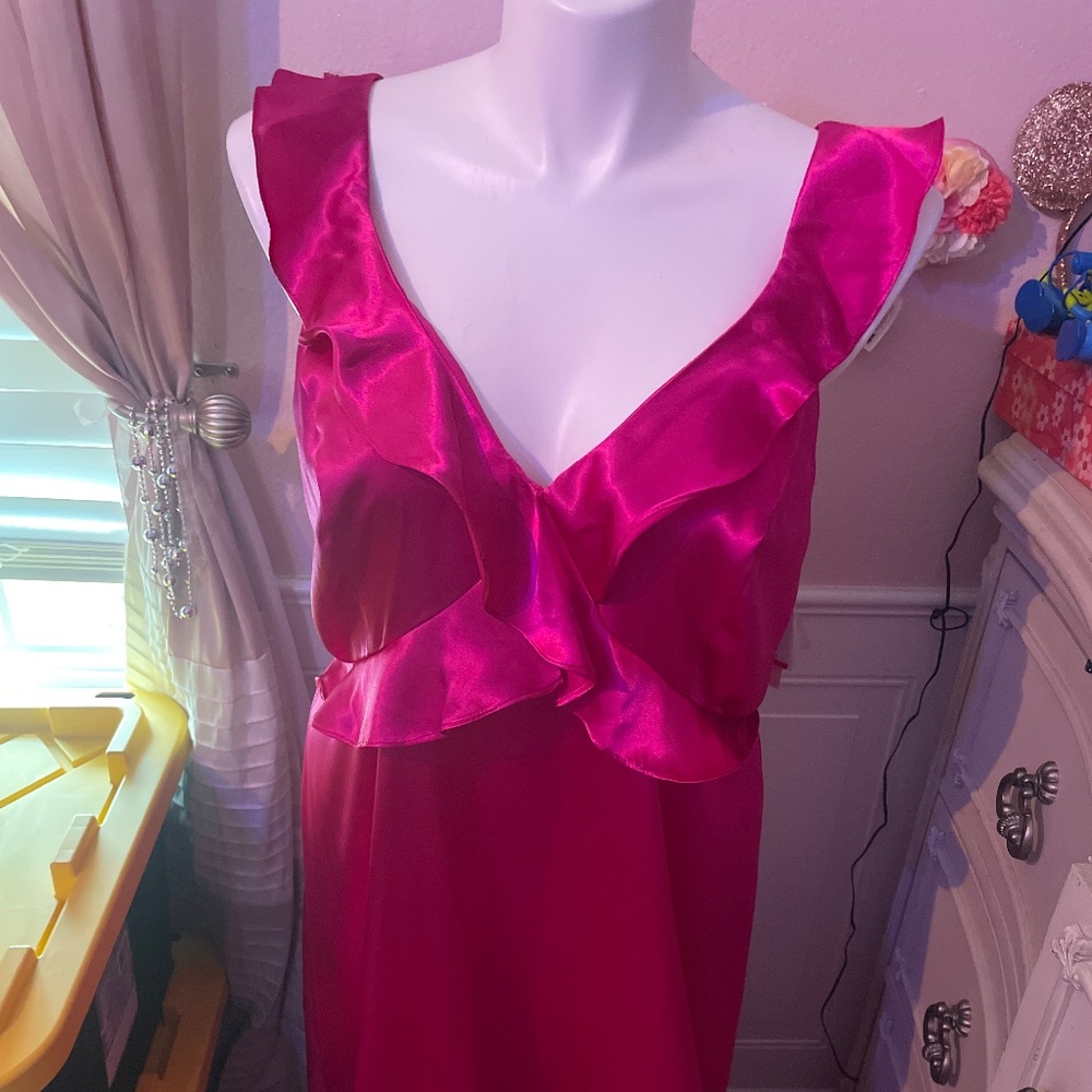 David’s bridal dress size 18 color says begonia but I think that means fuchsia